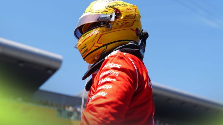 Lewis Hamilton, Ferrari, helmet on, pictured at the 2026 Barcelona-Catalunya Grand Prix