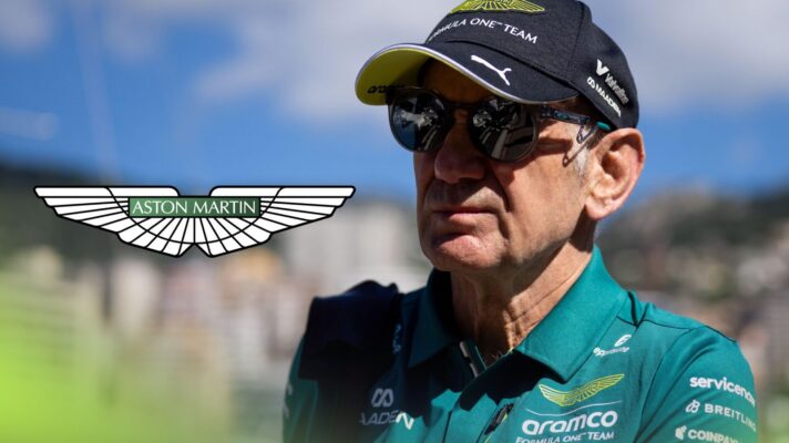 Adrian Newey pictured at the 2026 Monaco Grand Prix, as an Aston Martin logo appears on the left