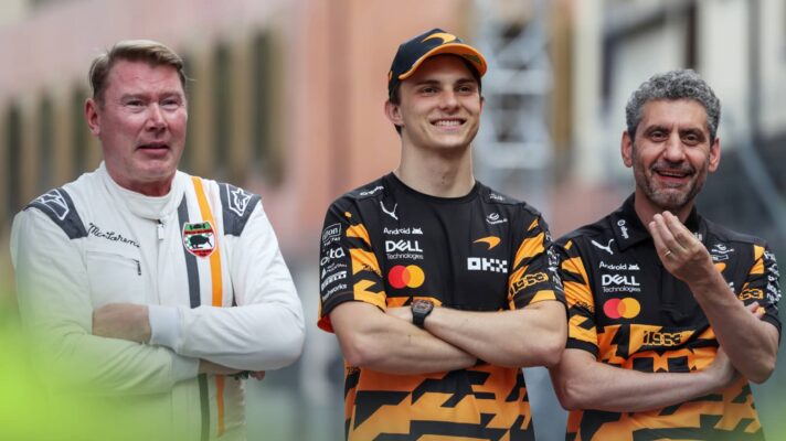 Mika Hakkinen, Oscar Piastri and Andrea Stella stood in a line on the grid in Monaco