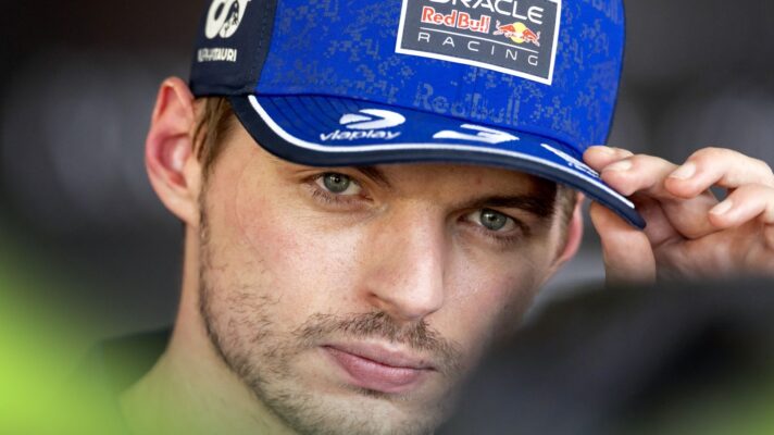 Red Bull driver Max Verstappen adjusts his cap at the 2026 Barcelona-Catalunya Grand Prix