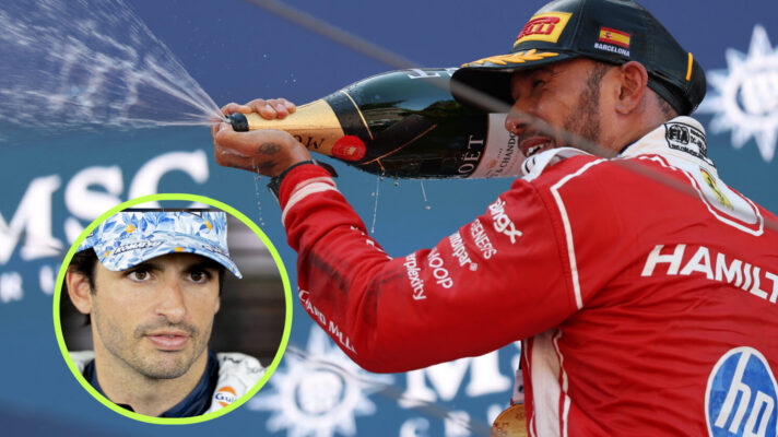 Lewis Hamilton sprays champagne on the podium after his maiden Ferrari win, Carlos Sainz in the cirlce