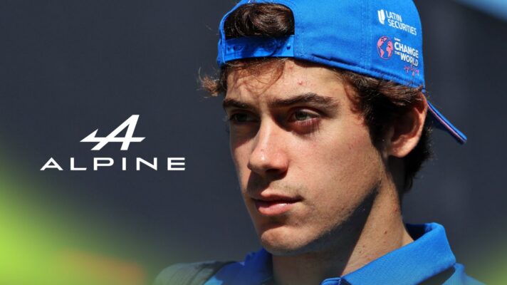 Franco Colapinto, Alpine, pictured at the 2026 Barcelona-Catalunya Grand Prix, as an Alpine logo appears on the left