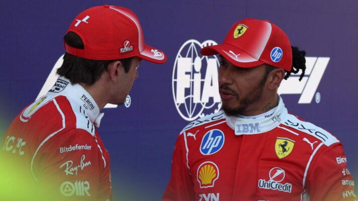 Ferrari drivers Charles Leclerc and Lewis Hamilton speak in parc ferme at the Austrian Grand Prix.