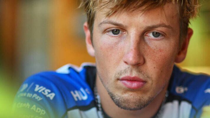 A close-up shot of Liam Lawson wearing a Racing Bulls t-shirt