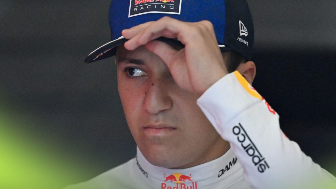 Isack Hadjar holds his cap in the Austrian GP media pen.