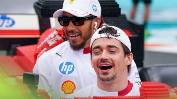 Charles Leclerc sitting in front of Lewis Hamilton in a two-seater LEGO F1 car
