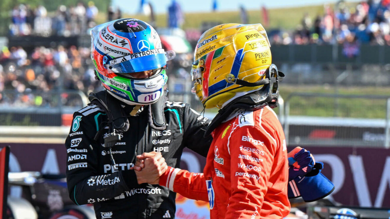 Lewis Hamilton and Kimi Antonelli shake hands after the session at Silverstone