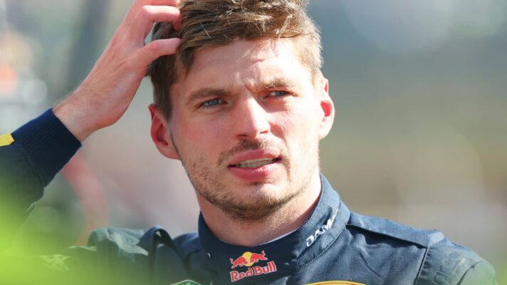 Max Verstappen scratches his head in parc ferme at Silverstone