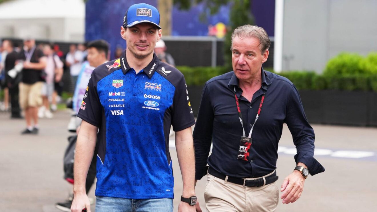 Red Bull's Max Verstappen with manager Raymond Vermeulen at the 2026 Australian Grand Prix.