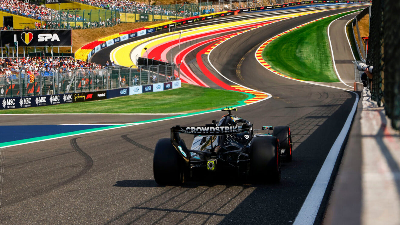 Kimi Antonelli on a lap of Spa, heading up the hill to Eau Rouge. Love Spa signage