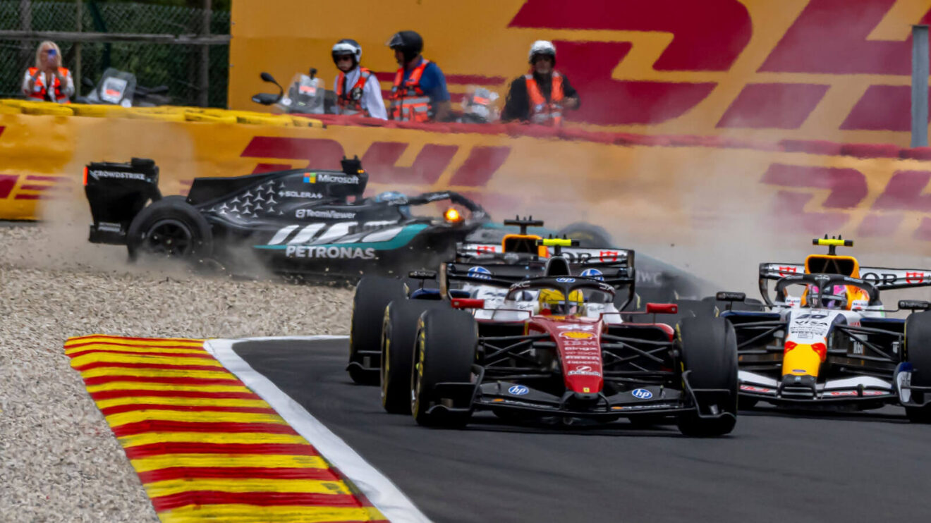 Lewis Hamilton drives off as George Russell spins into the gravel