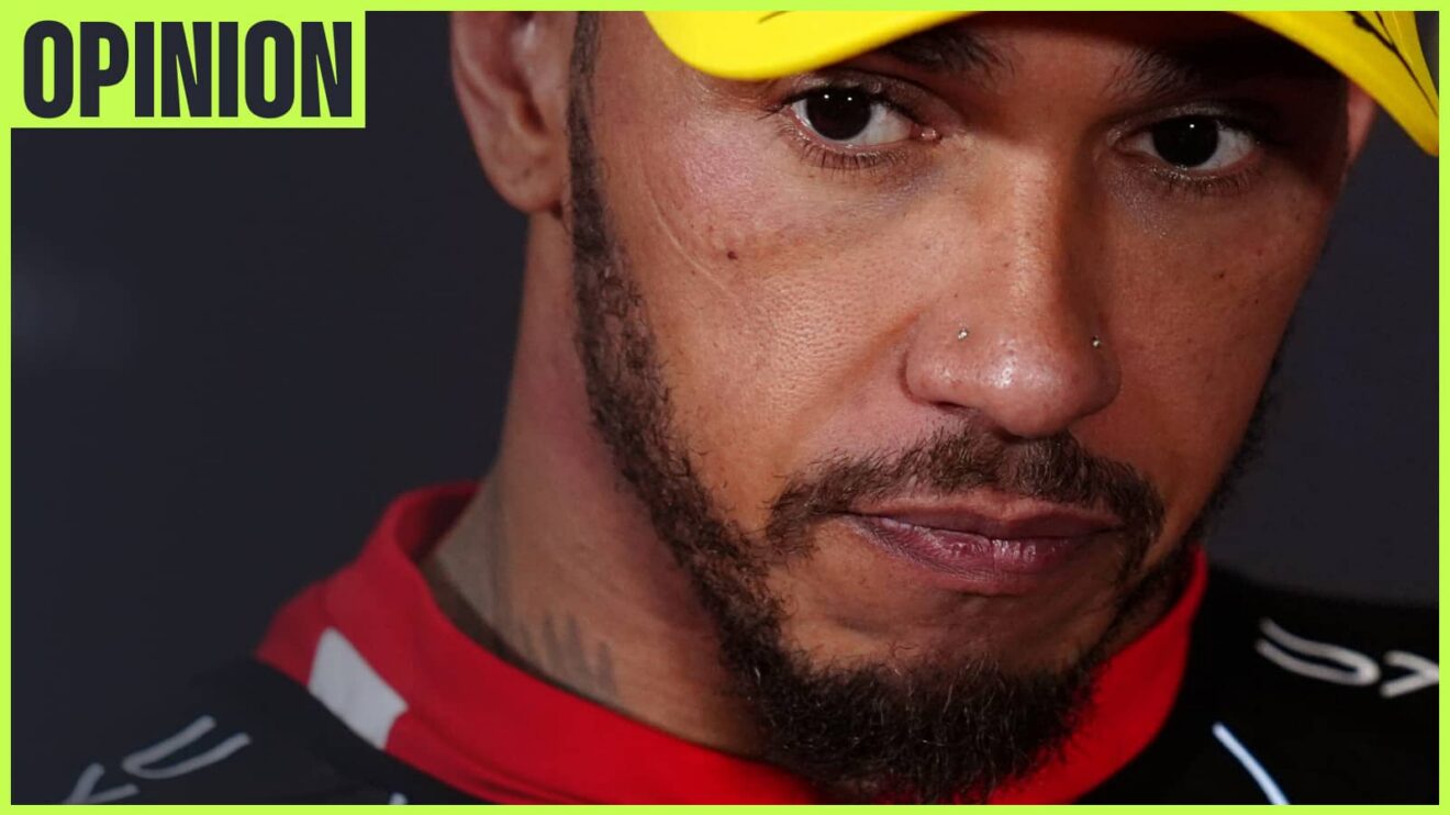 A close-up shot of Lewis Hamilton in a press conference with an 'opinion' tab in the top-left corner