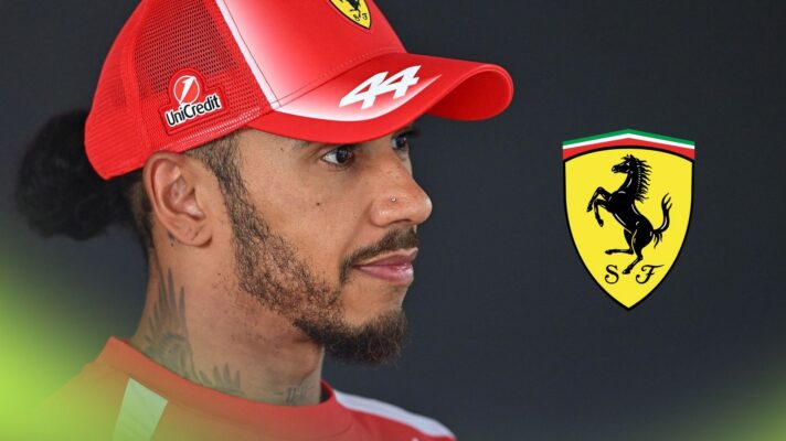 Lewis Hamilton pictured at the 2026 Belgian Grand Prix, looking towards a Ferrari logo on the right