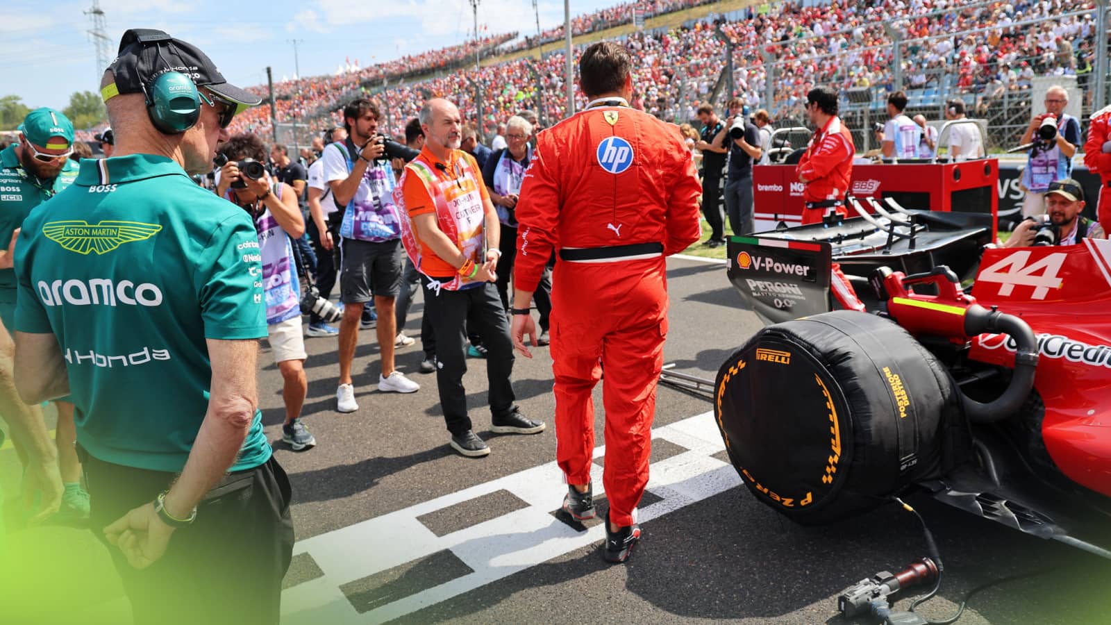 Adrian Newey examining the rear of Lewis Hamilton's Ferrari on the grid in Budapest