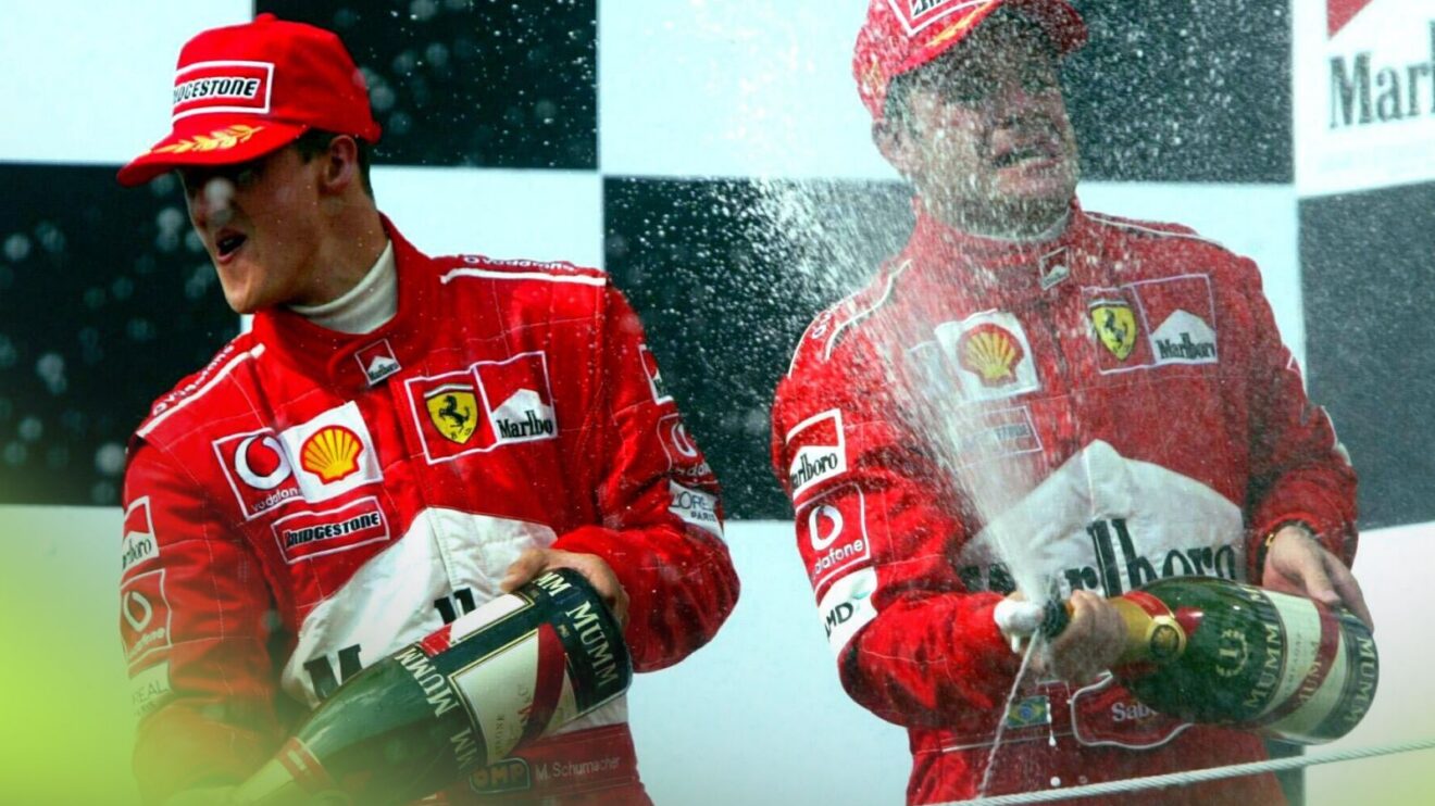 Ferrari teammates Michael Schumacher and Rubens Barrichello celebrate on the 2002 Hungarian Grand Prix podium