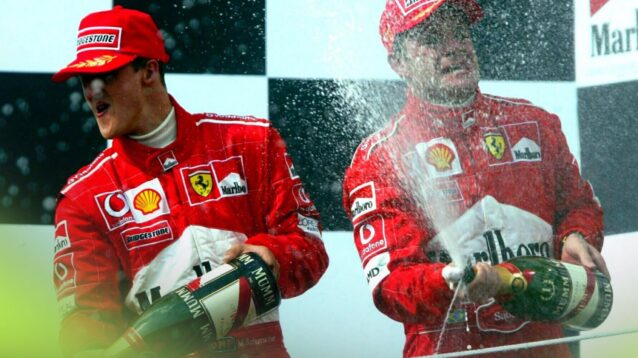 Ferrari teammates Michael Schumacher and Rubens Barrichello celebrate on the 2002 Hungarian Grand Prix podium