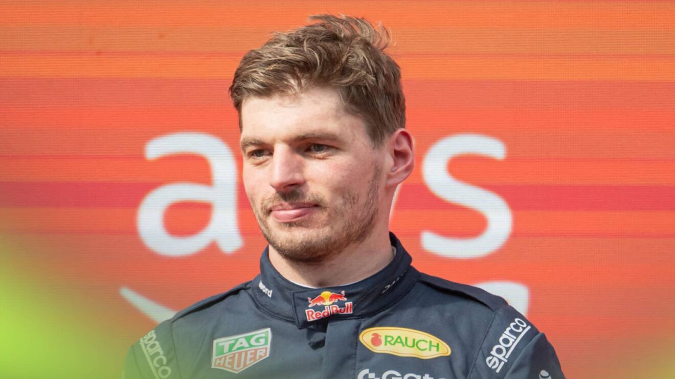 Max Verstappen looks on during the podium celebrations