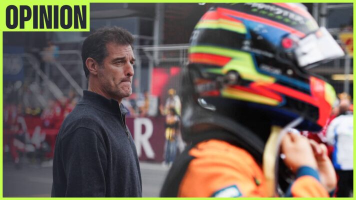 Oscar Piastri fastens his helmet on the grid as Mark Webber looks on in the background. An 'opinion' tab is in the top-left corner