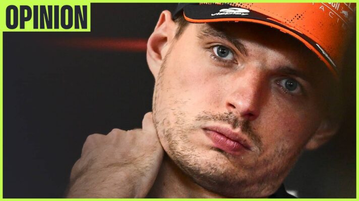 Max Verstappen tilts his head in a press conference while holding his hand to his neck. An 'opinion' tab is in the top-left corner