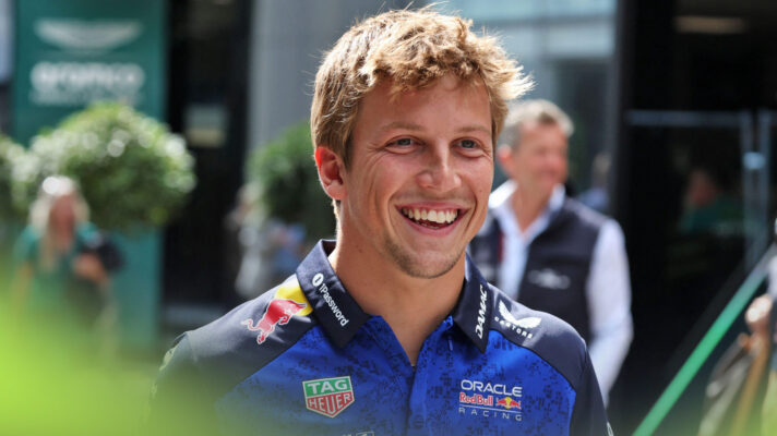 A smiling Liam Lawson in Red Bull team gear at the Dutch GP.