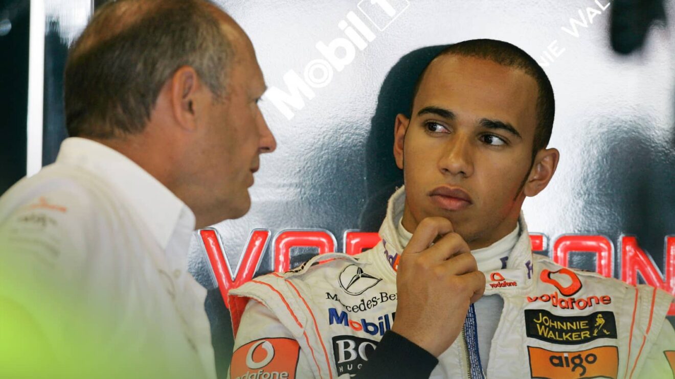 Lewis Hamilton and Ron Dennis in conversation in the McLaren garage