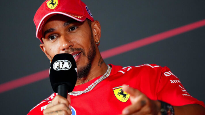 Lewis Hamilton Monza press conference gesturing while holding the mic