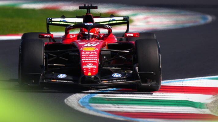 Charles Leclerc's Ferrari runs over the kerbs painted in the colours of the Italian flag at Monza