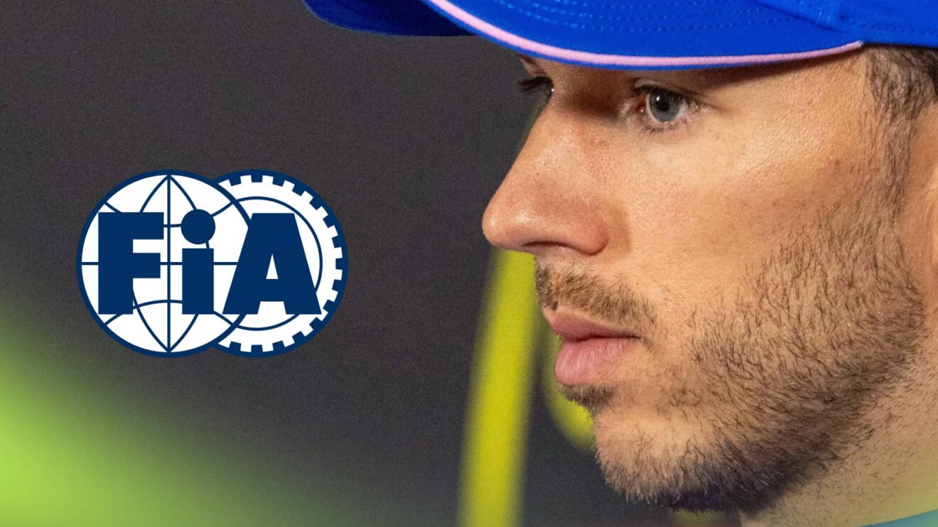 A side-profile shot of Pierre Gasly in a press conference with a prominent FIA logo alongside him