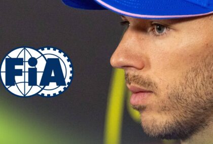 A side-profile shot of Pierre Gasly in a press conference with a prominent FIA logo alongside him