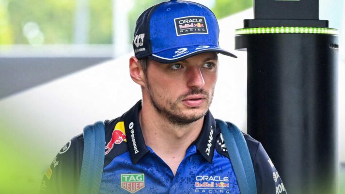 Red Bull driver Max Verstappen enters the paddock.