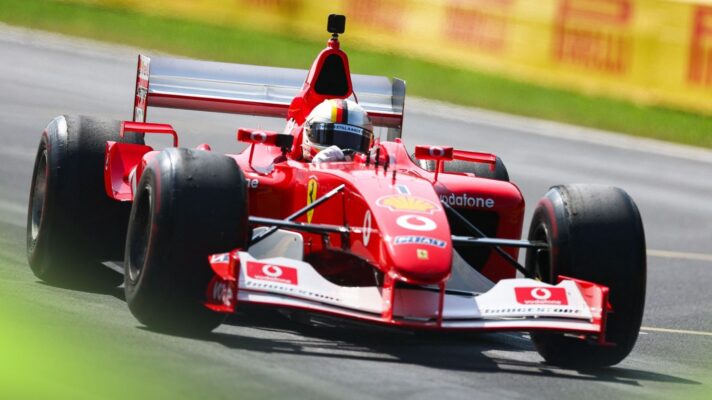 Sebastian Vettel driving Michael Schumacher's Ferrari F2002 at the 2026 Italian Grand Prix