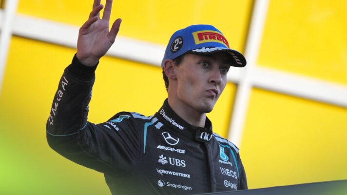 George Russell, Mercedes, waves from the podium at the 2026 Italian Grand Prix