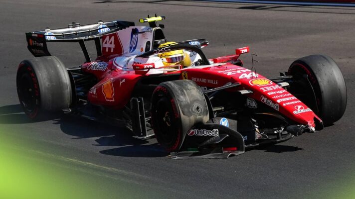 Lewis Hamilton driving his damaged Ferrari with the front wing dislodged and a front-right puncture