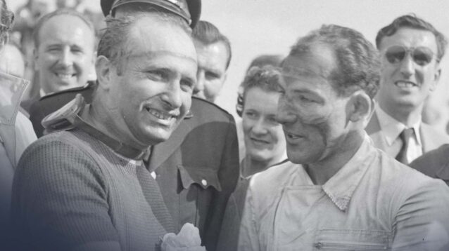 Juan Manuel Fangio, left, stands with Stirling Moss, right.