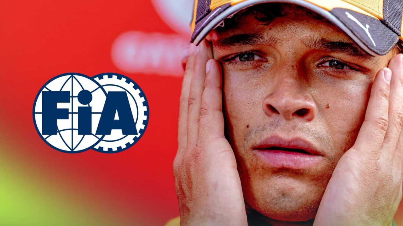 Lando Norris holds his hands to his face with the FIA logo alongside him against a red background