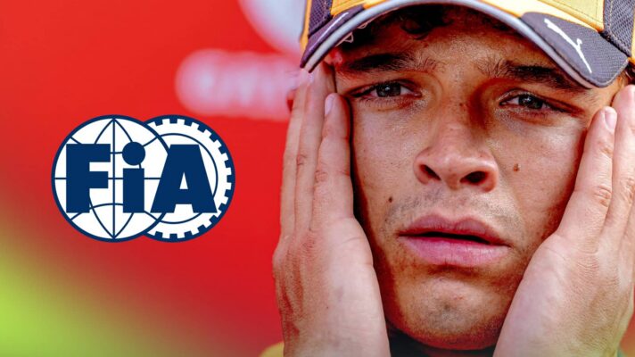 Lando Norris holds his hands to his face with the FIA logo alongside him against a red background