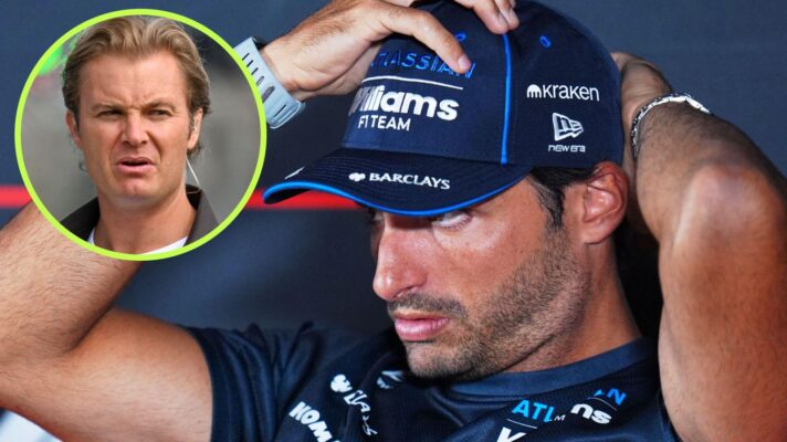 Carlos Sainz, Williams, puts his hands to his head at the 2026 Spanish Grand Prix, as Nico Rosberg appears in a top left circle