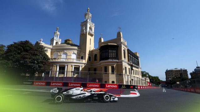 Valtteri Bottas's Cadillac on track in Baku with buildings in the background
