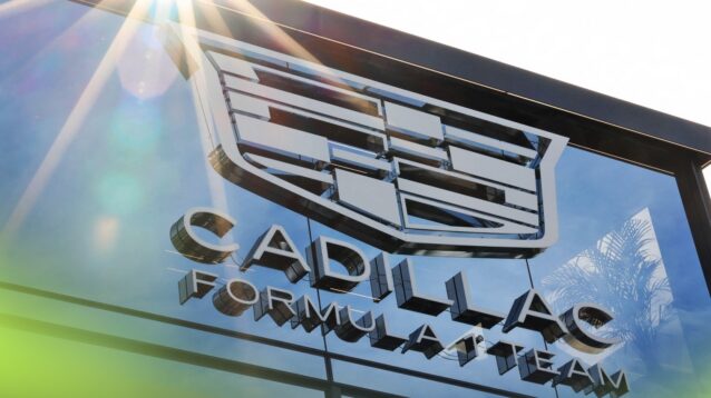 The Cadillac logo on the side of the team's hospitality building.
