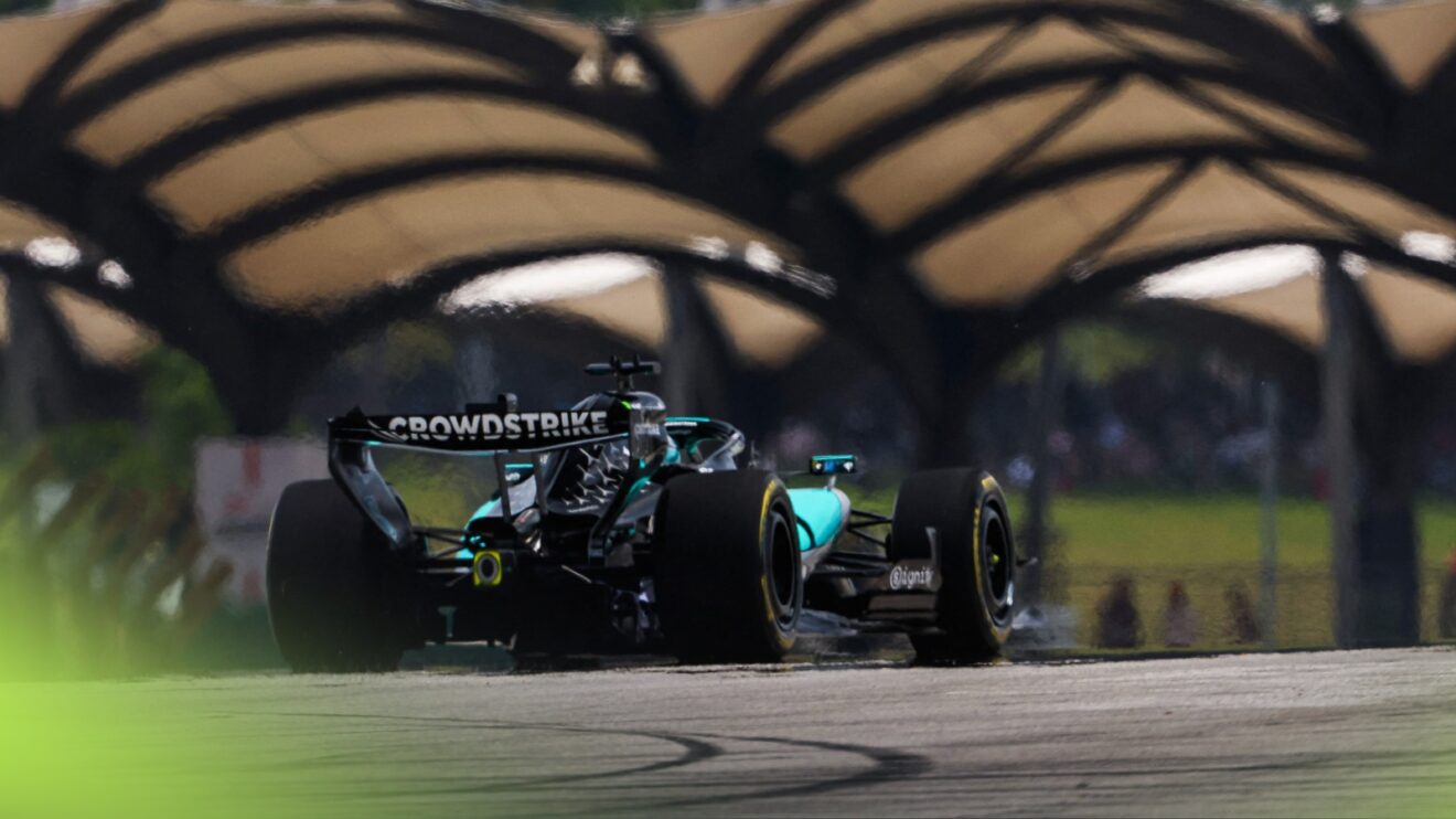Russell crests a hill in Malaysia