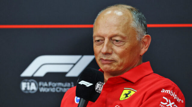 Fred Vasseur holding the F1 mic during a press conference