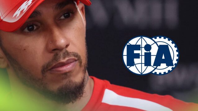 A close-up shot of Lewis Hamilton wearing a red Ferrari t-shirt and cap with a prominent FIA logo alongside him