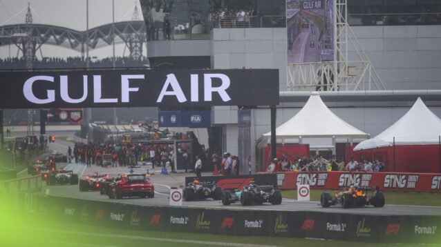 The field enters the pit lane as the Bahrain GP in Malaysia start was suspended.