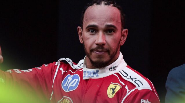 Lewis Hamilton stands after the race.