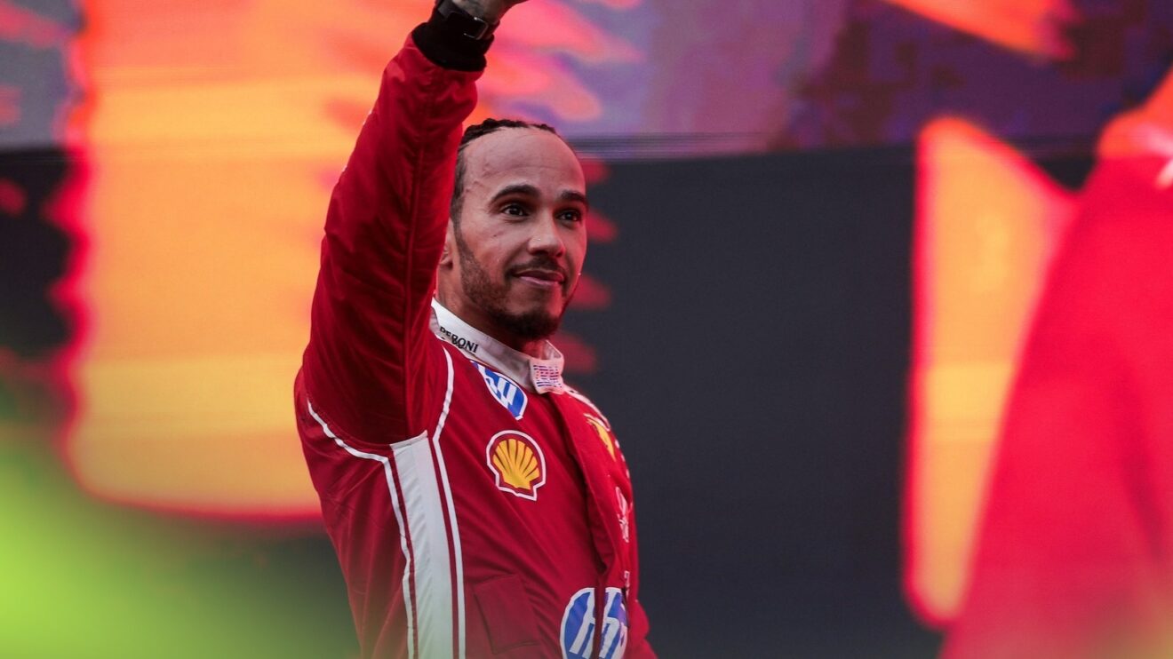 Lewis Hamilton celebrates in parc ferme after finishing third in the Bahrain GP in Malaysia.