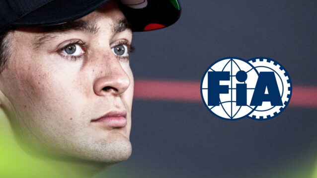 A close-up shot of George Russell in a press conference with an FIA logo alongside him