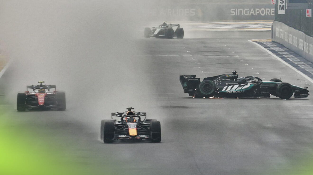 Max Verstappen and Lewis Hamilton head down the main straight at Singapore as George Russell spins in the background
