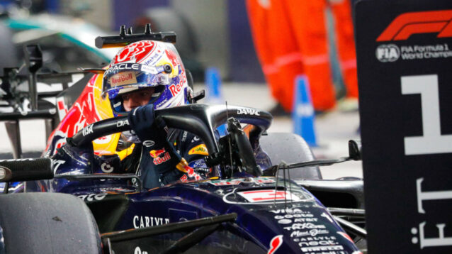 Max Verstappen pulls up in front of the No1 board
