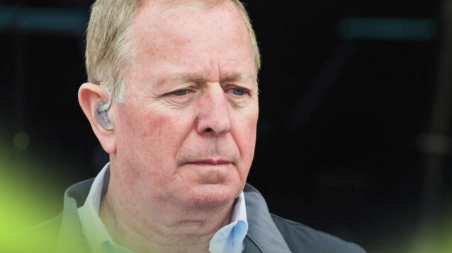Martin Brundle looks on against a dark background
