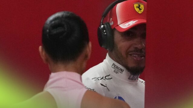 Lewis Hamilton speaks to Kim Kardashian in the Ferrari garage at the 2026 Singapore Grand Prix